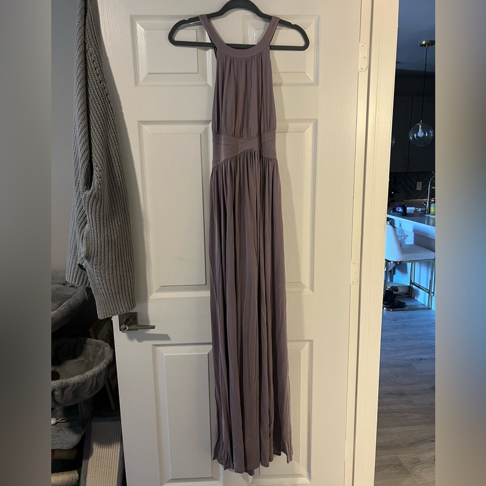 Muted lavender maxi dress with open back and waist ties to enhance shape